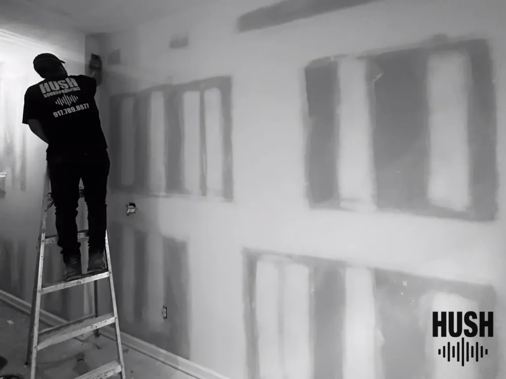 Hush crew finishing a new partition in a Brooklyn apartment